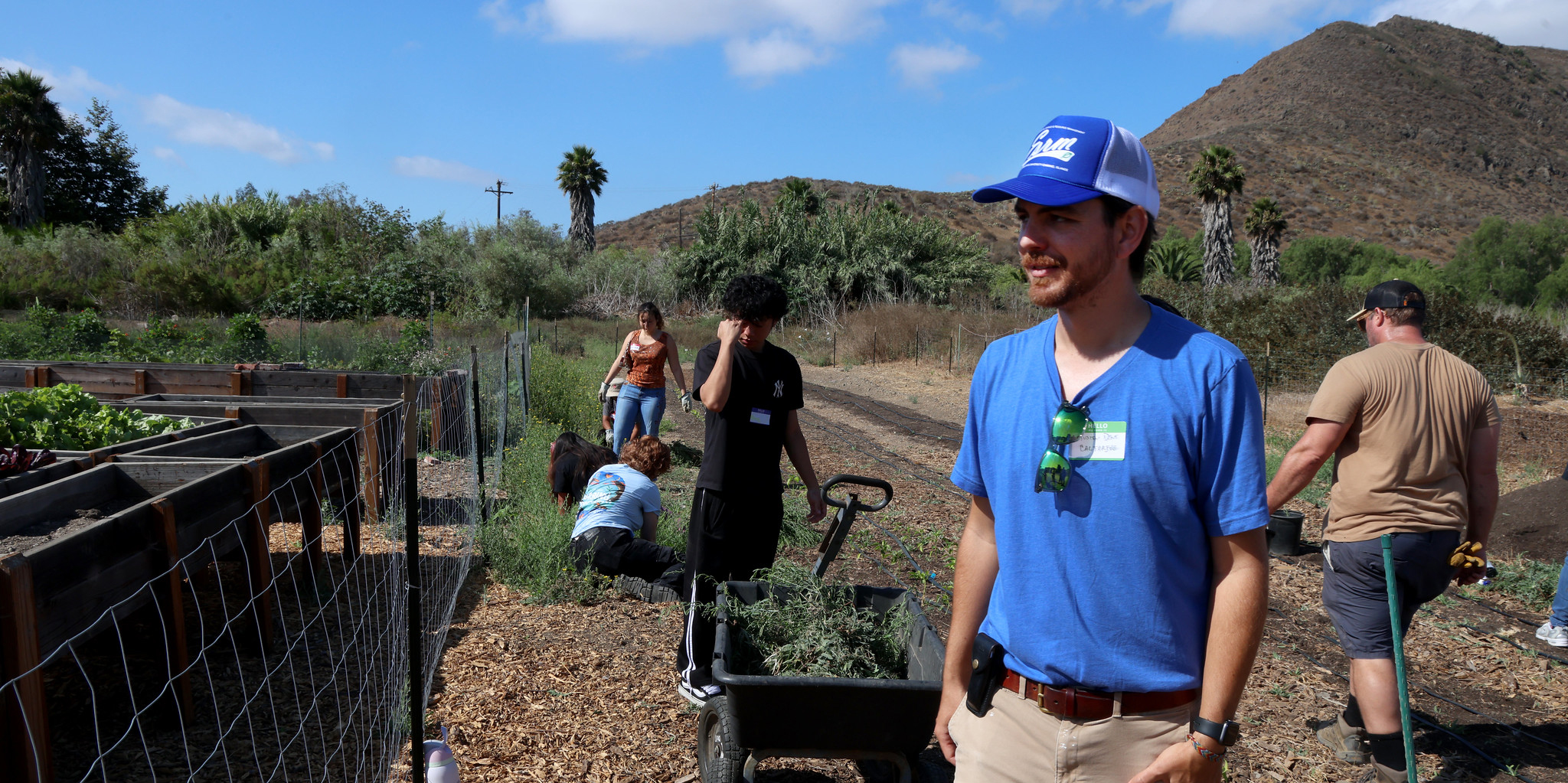 Austin Dent - President and founding boardmeber Austin Dent leads volunteer crews as they prepare new rows for planting.